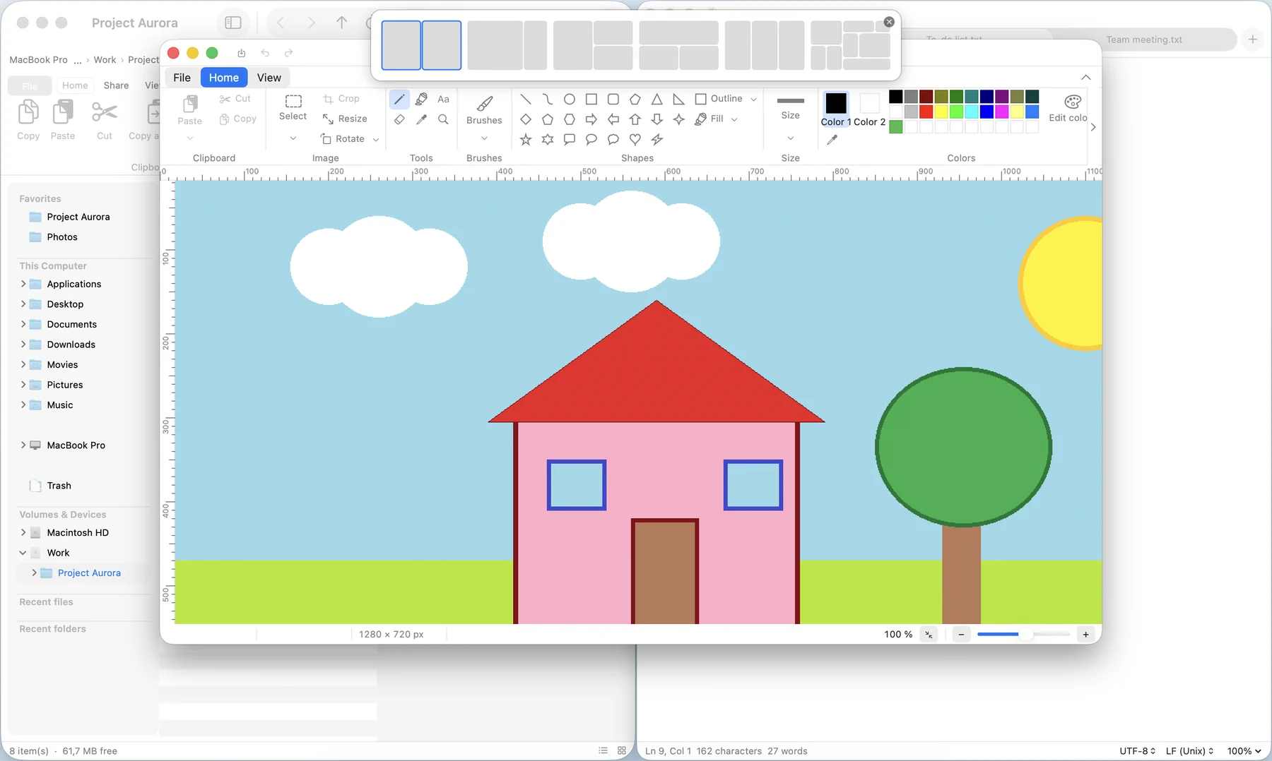 Snap layouts panel open at the top of the screen, with six ways to split the windows.